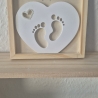 Herz mit Babyfüschen im Bilderrahmen