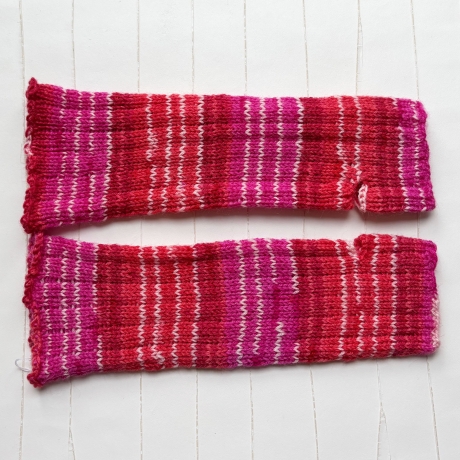 Handstulpen mit Daumenloch Rottöne gestrickt Umfang bis ca 27 cm