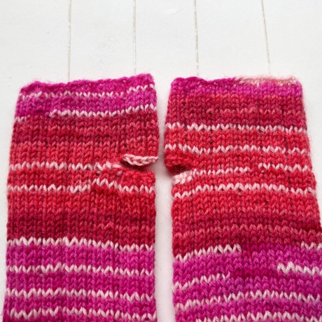 Handstulpen mit Daumenloch Rottöne gestrickt Umfang bis ca 27 cm