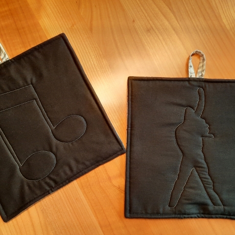 Noten + Musikersilhouette Topflappen