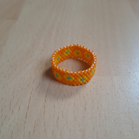 Ring aus Miyuki Delicas, orange /bunt, Handarbeit