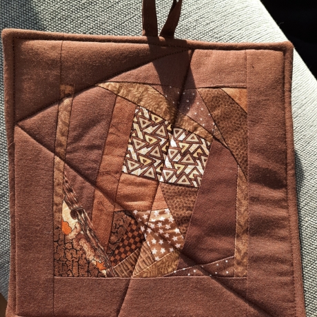 braun gemusterte Patchwork Topflappen