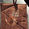 braun gemusterte Patchwork Topflappen