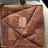 braun gemusterte Patchwork Topflappen
