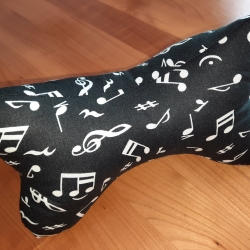 Leseknochen aus Musik-Noten-Stoff - Hintergrund schwarz