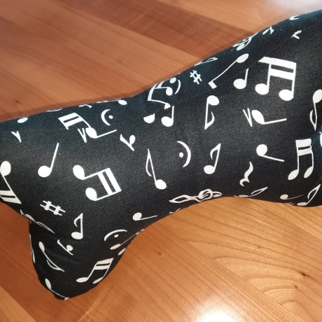 Leseknochen aus Musik-Noten-Stoff - Hintergrund schwarz