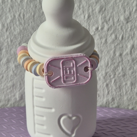 Nukki Flasche mit Süßigkeiten gefüllt