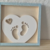 Herz mit Babyfüschen im Bilderrahmen