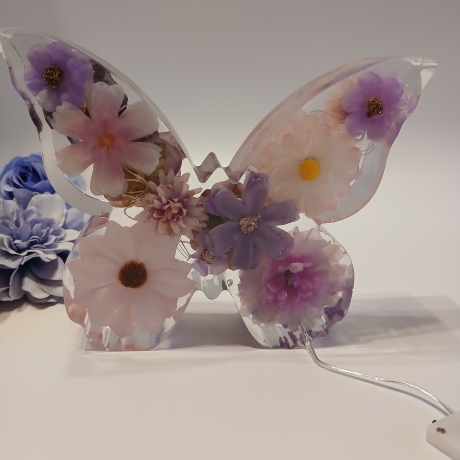 Epoxidharz Schmetterling beleuchtet