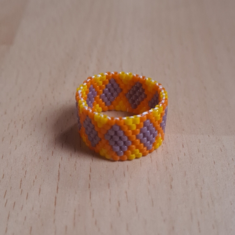 Ring aus Miyuki Delicas, gelb/orange/lila, Unikat