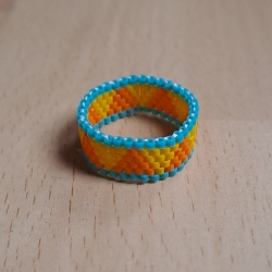 Ring aus Miyuki Delicas, orange/gelb/türkis,Unikat