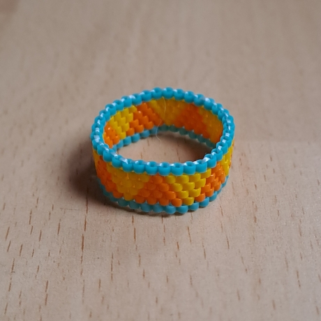 Ring aus Miyuki Delicas, orange/gelb/türkis,Unikat