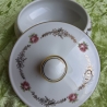 Edles französisches Deckeldöschen mit Rosen- und Golddekor.