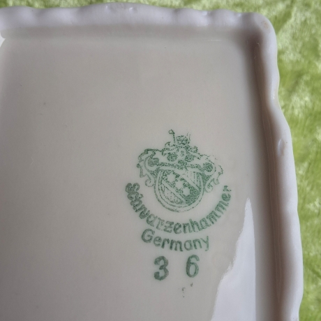 Religiös-symbolische Porzellankunst. Jesus mit flammenden Herz.