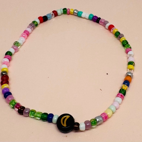 Perlenarmband mit Eule, Mond, Stern und Herz