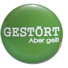 Button 25 mm mit Anstecknadel Spruch Gestört, aber geil