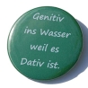 Button 25 mm mit Anstecknadel Spruch Genitiv ins Wasser