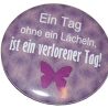 Button 50 mm mit Anstecknadel Weisheit Ein Tag ohne ein Lächeln