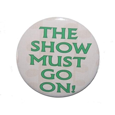 Button 50 mm mit Anstecknadel Spruch The Show must go on