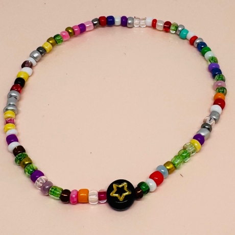 Perlenarmband mit Eule, Mond, Stern und Herz