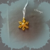 Drei Schneeflocken in Gold