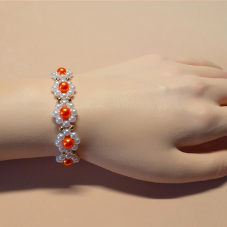 Armband Gänseblümchen Orange Perlenschmuck niedlich Armreifen 