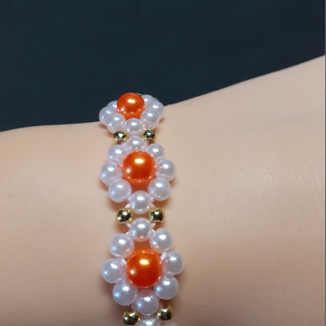 Armband Gänseblümchen Orange Perlenschmuck niedlich Armreifen 