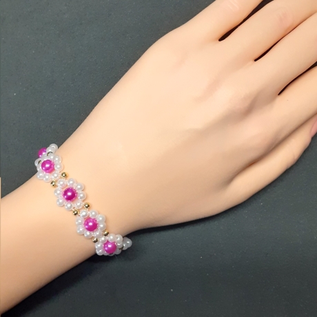 Armband Gänseblümchen Pink Perlenschmuck niedlich Armreifen 