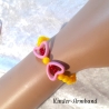 Kinder-Armband Schmuck elastisch Perlen gefädelt Gelb & Schleife