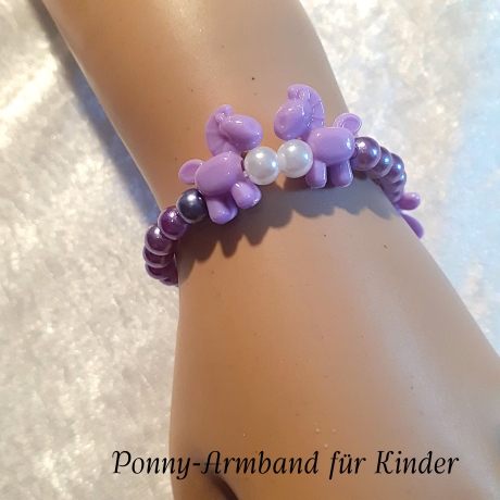 Kinder-Armband Schmuck elastisch Perlen gefädelt Lila mit Ponny