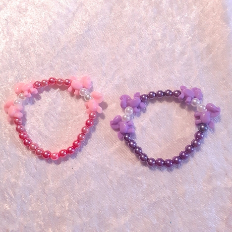 Kinder-Armband Schmuck elastisch Perlen gefädelt Rosa mit Ponny