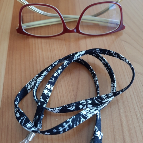   Zart gemustertes schwarz-weißes Brillenband, für Sie oder Ihn