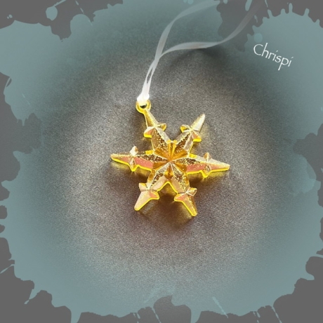 Drei Schneeflocken in Gold