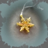 Drei Schneeflocken in Gold