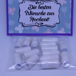 Kapseln mit Wünschen zur Hochzeit Lila