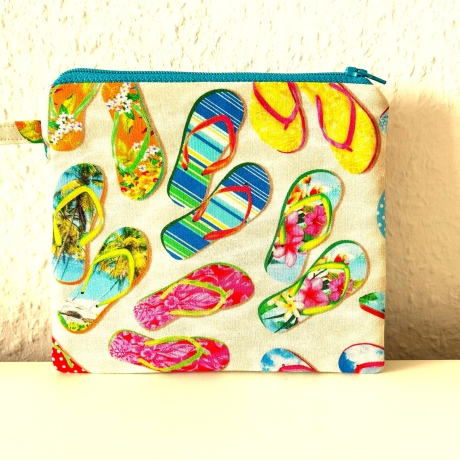 Flaches Schminktäschchen Flip-Flops