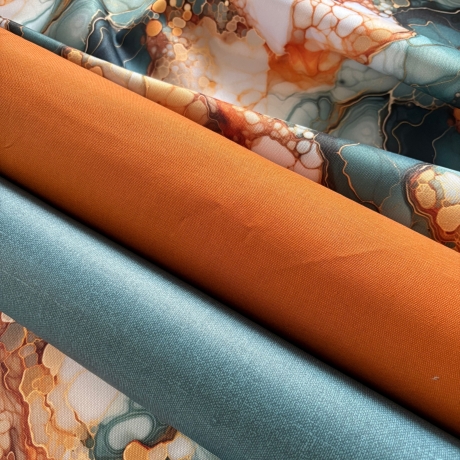 Flowing Bloom Liquid Bernstein Petrol Gold Taschenstoff