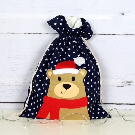 Geschenkbeutel für Weihnachten mit Bär mit Weihnachtsmütze