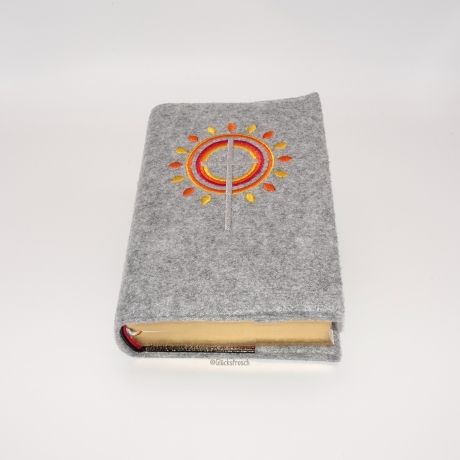 Gotteslobhülle mit  Kreuz, Kreise Strahlen rot, gelb, orange