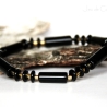elastisches Onyx-Armband mit vergoldeten Silber-Elementen