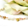 Süßwasserperlen-Armband (elastisch) in Weiß mit Rocailles in Rosa