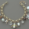 Vergoldetes Weihnachtsarmband mit Charms – Festlicher Armband