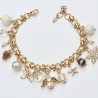 Vergoldetes Weihnachtsarmband mit Charms – Festlicher Armband