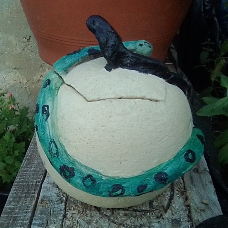 ceramic jar with snakes