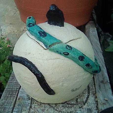 ceramic jar with snakes