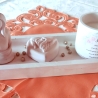 Platte mit Figur, Herz und Kerze