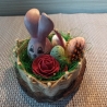 Süße Osterdeko auf Baumscheiben