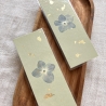 Lesezeichen mit gepressten Blumen • pastellgrün gold