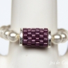 Kugelring (elastisch) in Weiß mit Röhre aus Delica-Beads in Mauve