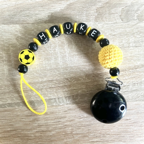 Schnullerkette Ball mit bis zu 6 Buchstaben schwarz/gelb aus Holz